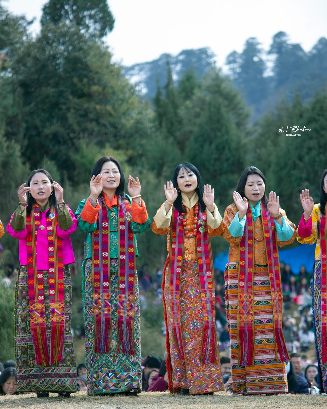 Bhutanese in traditional kira — festival dress